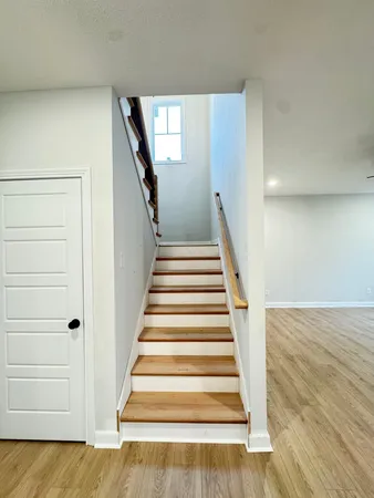a view of entryway with wooden floor