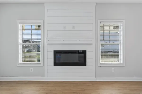 a white building with a fireplace