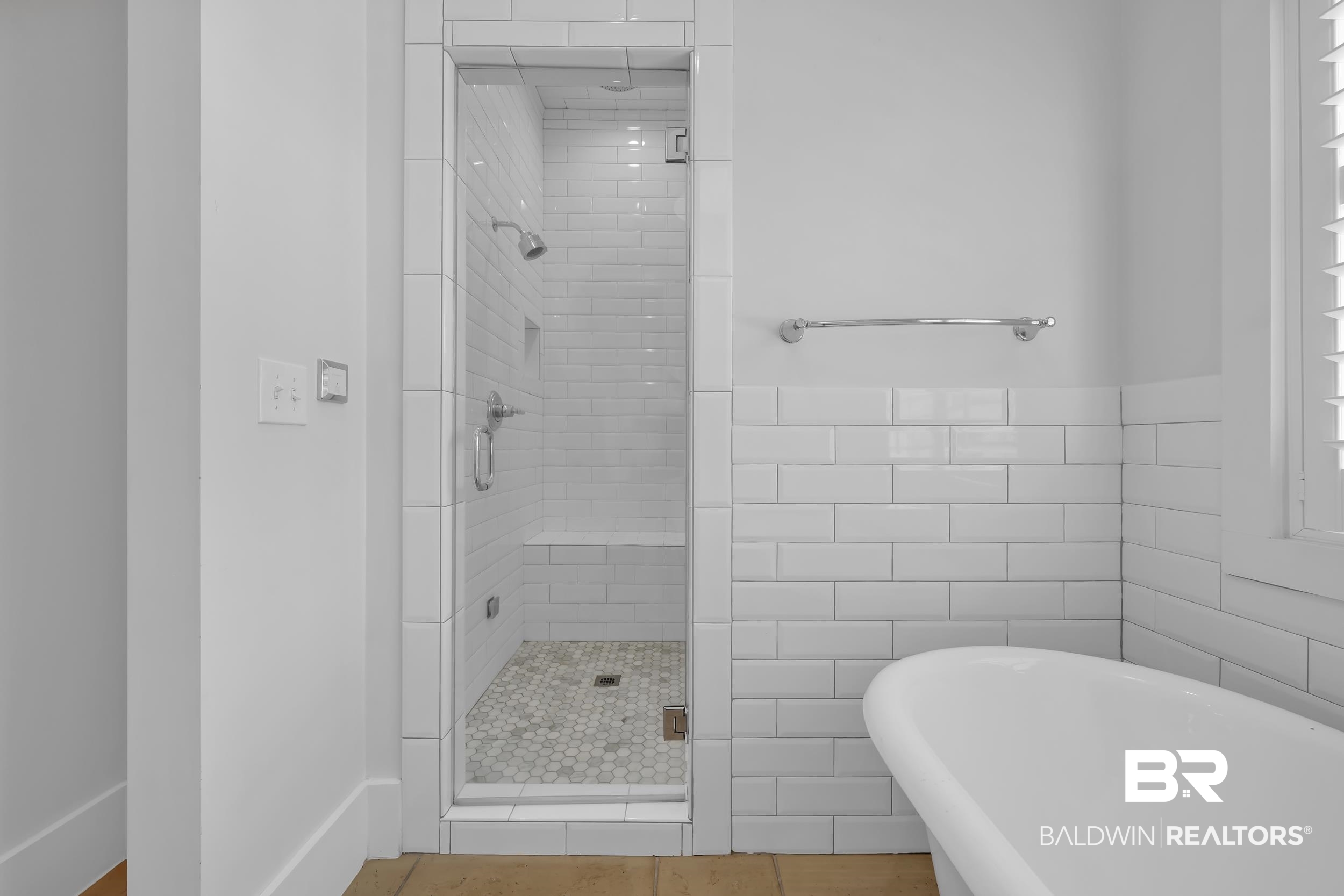 43199 Pine Grove Road Bay Minette, AL 36507 - Photo 49 of 71 Glass-enclosed shower with subway tile surround, integrated bench, and hexagonal tile flooring