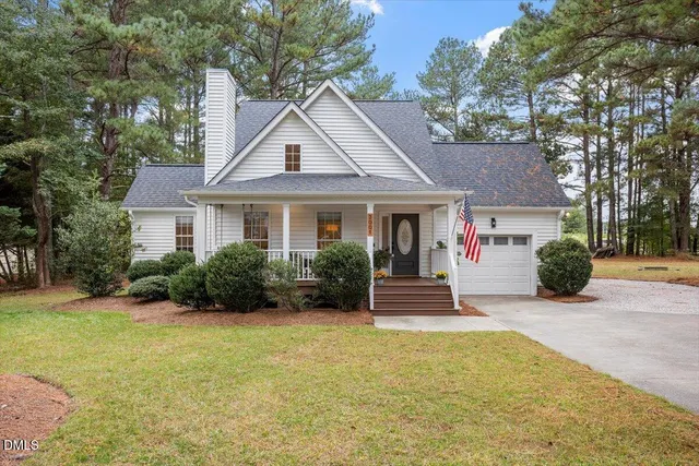 a front view of a house with a porch