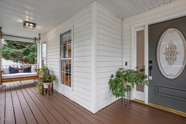 a view of a entryway door with wooden floor