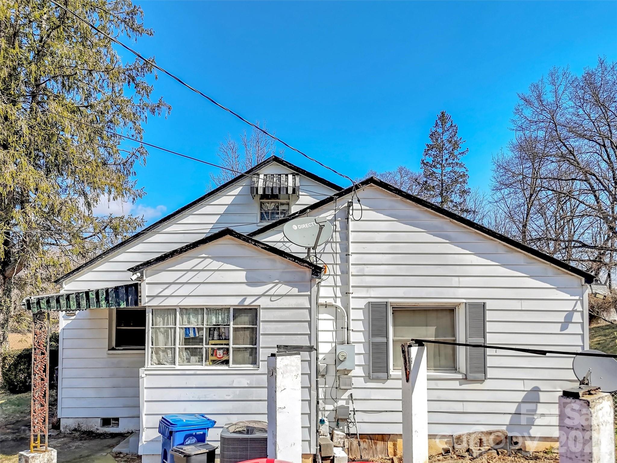 301 Mulberry Street Clyde, NC 28721 - Photo 15 of 23 a view of a house with a small space