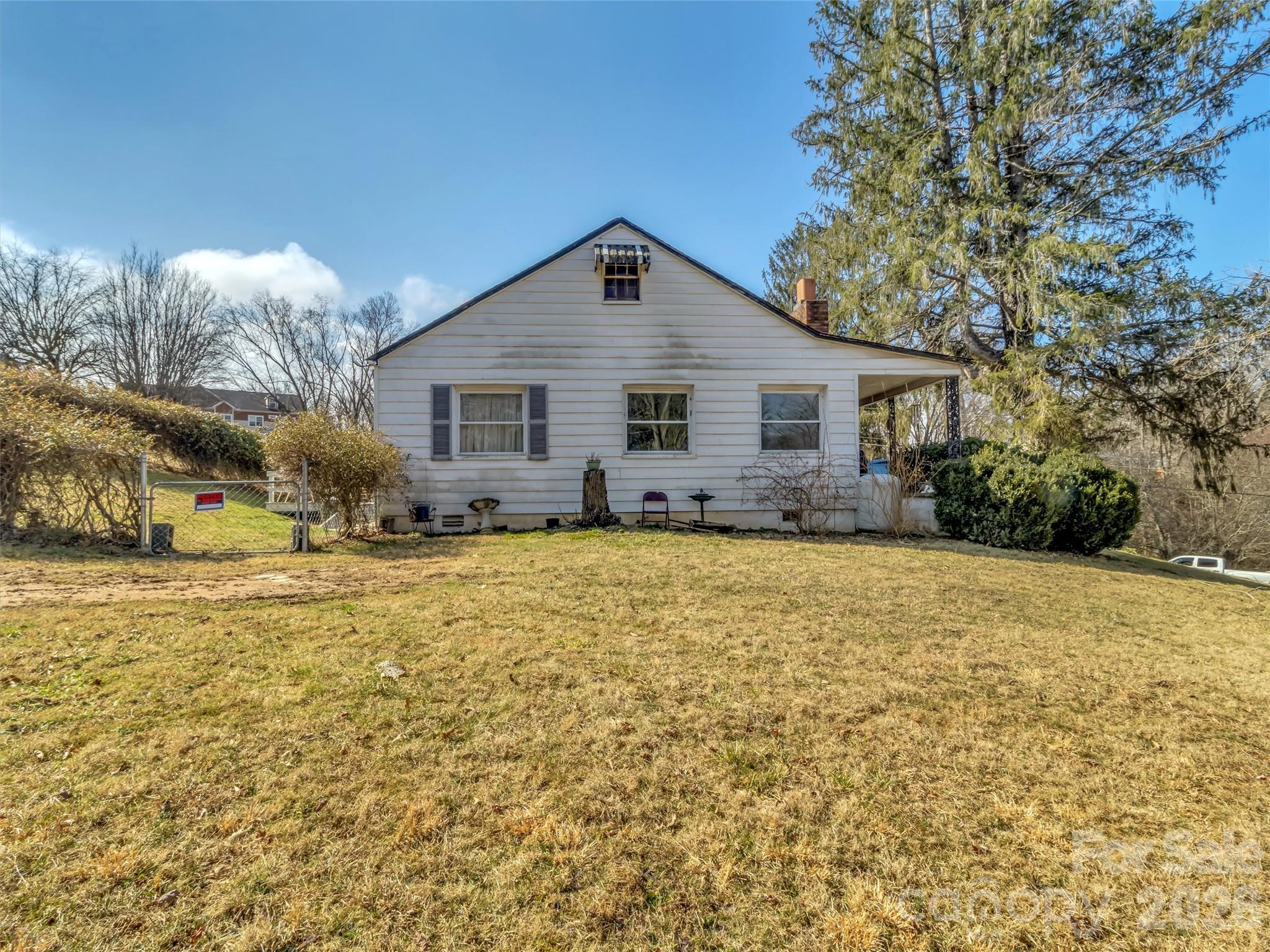 301 Mulberry Street Clyde, NC 28721 - Photo 16 of 23 a view of a house with outdoor space