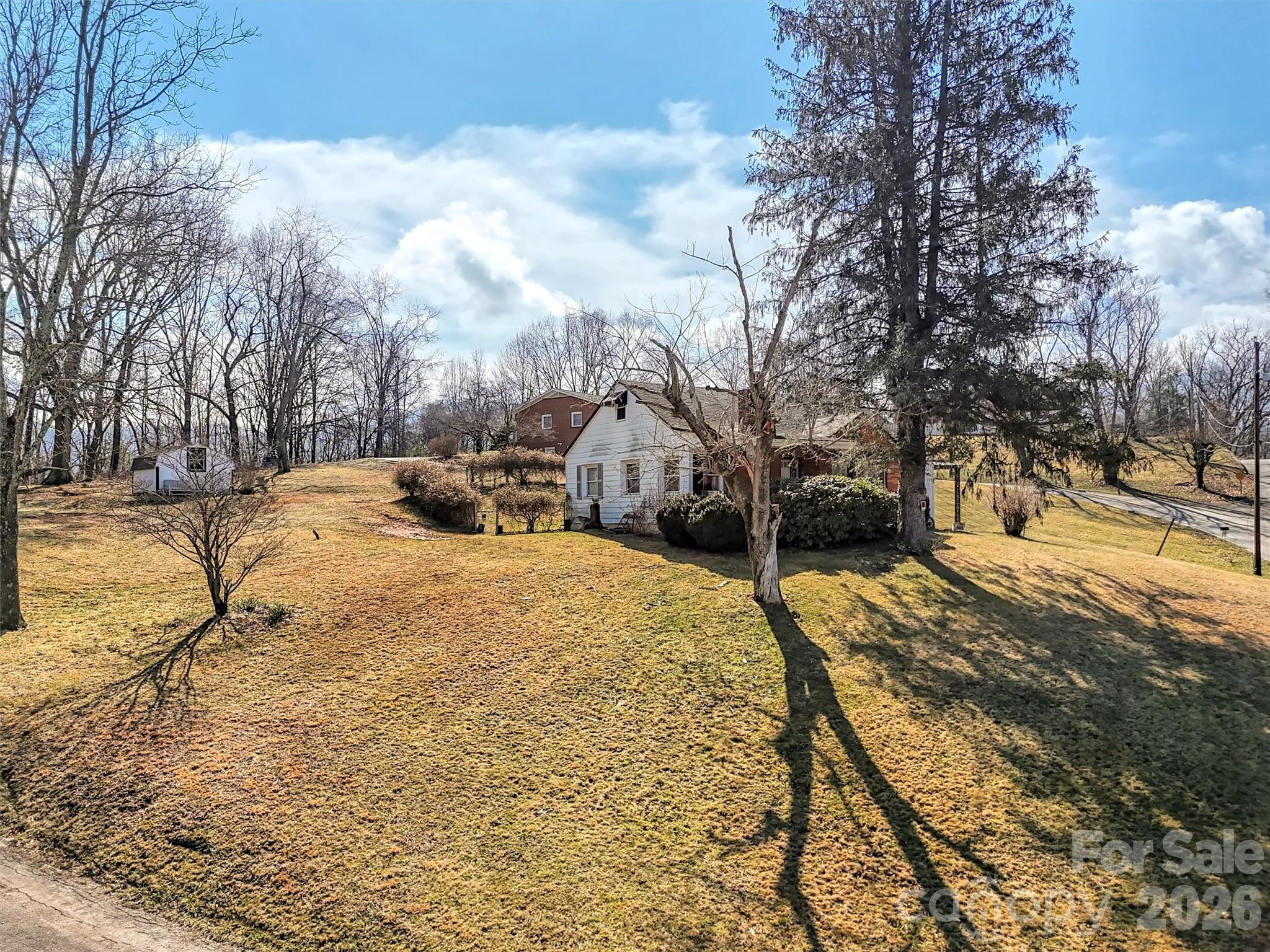 301 Mulberry Street Clyde, NC 28721 - Photo 21 of 23 a street view covered with snow