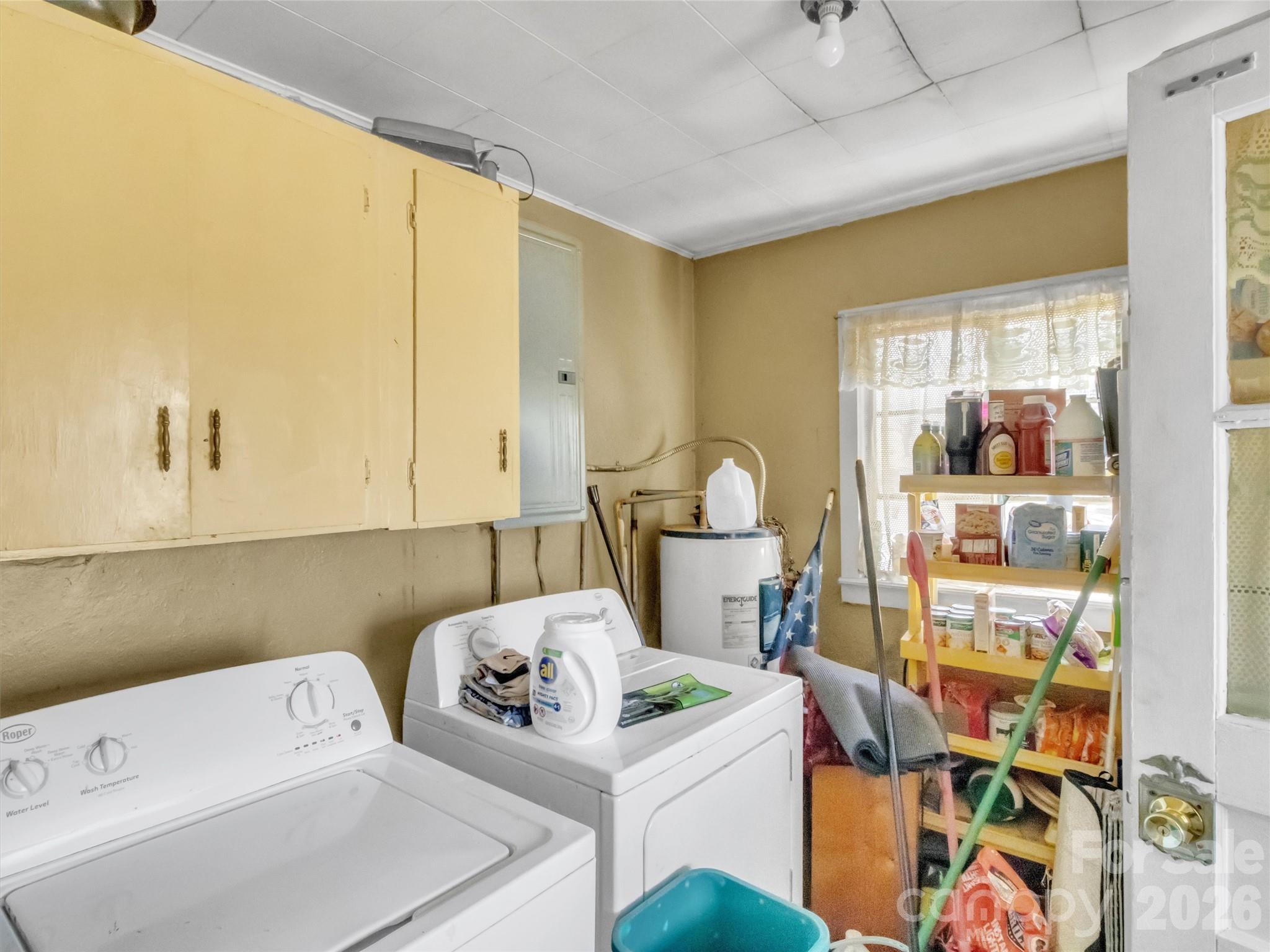 301 Mulberry Street Clyde, NC 28721 - Photo 10 of 23 a utility room with dryer and washer