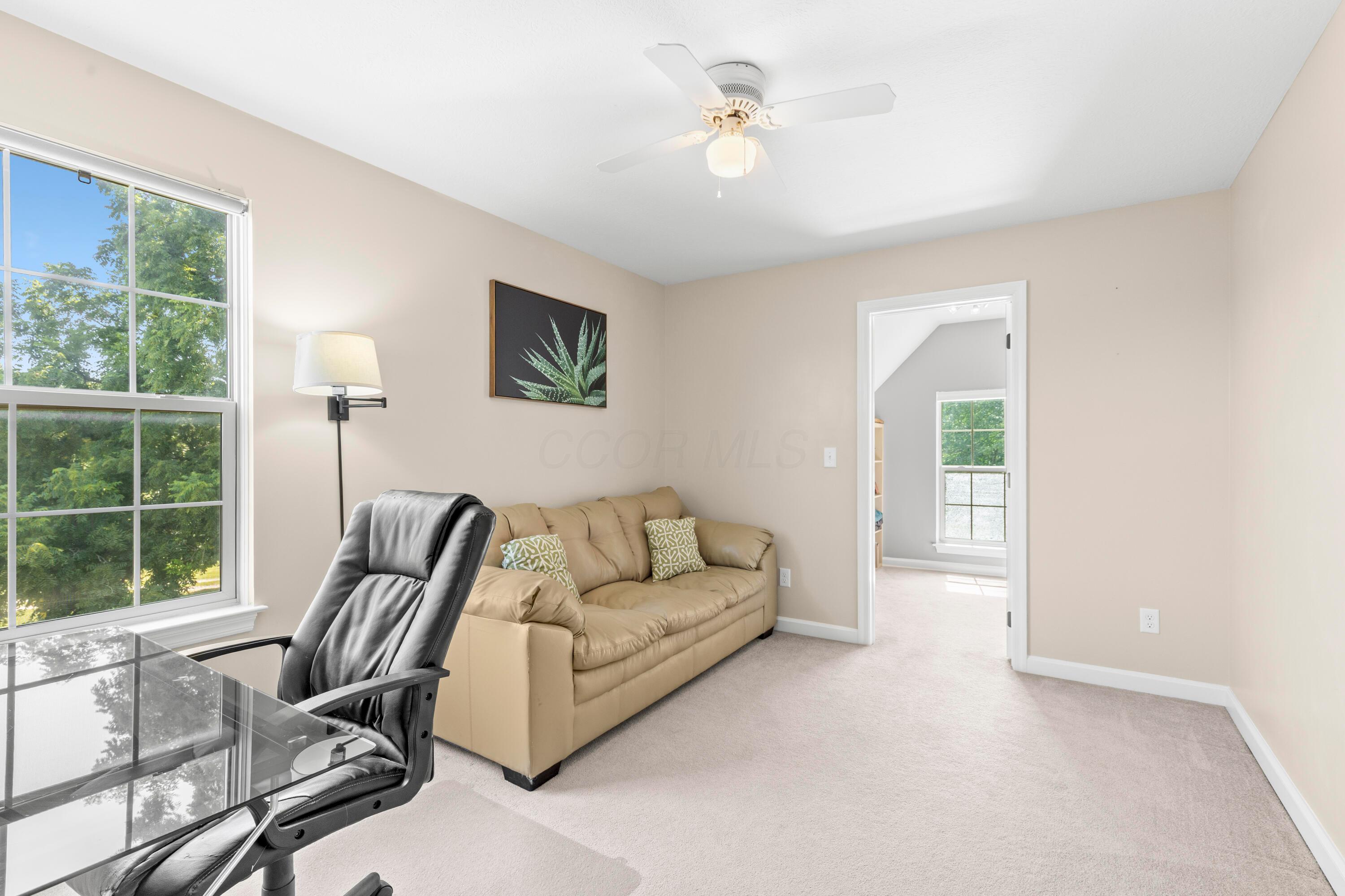1515 Dale Ford Road Delaware, OH 43015 - Photo 39 of 74 • Light sand carpet • Ivory painted walls • Lighted ceiling fan