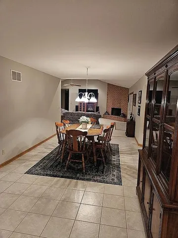 a dining room well furnished