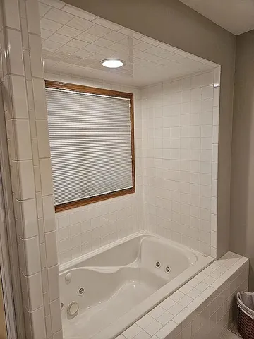 a bathroom with a bathtub
