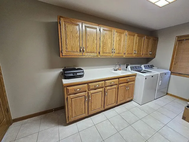 a kitchen with a cabinets and a stove top oven