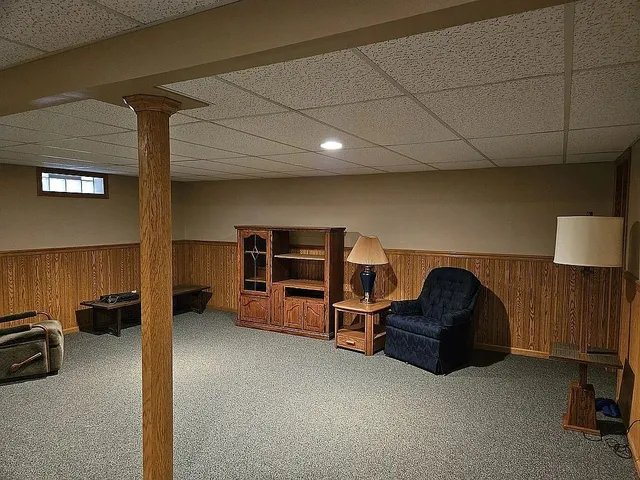 a view of a livingroom with furniture and furniture