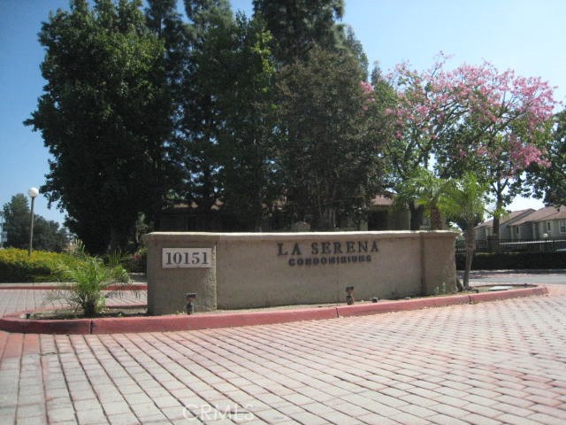 10151 Arrow Route, Unit 11 Rancho Cucamonga, CA 91730 - Photo 20 of 28 a view of outdoor space with wooden fence