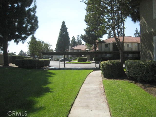 10151 Arrow Route, Unit 11 Rancho Cucamonga, CA 91730 - Photo 2 of 28 a view of a park with plants and trees