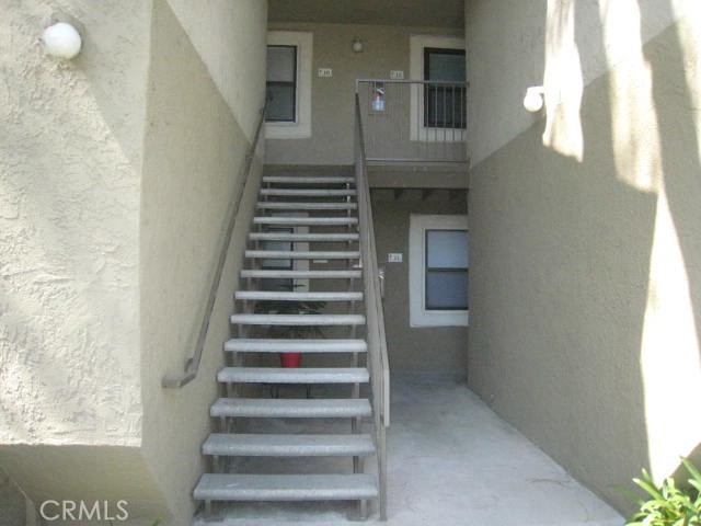 10151 Arrow Route, Unit 11 Rancho Cucamonga, CA 91730 - Photo 4 of 28 a view of entryway and hall with wooden floor