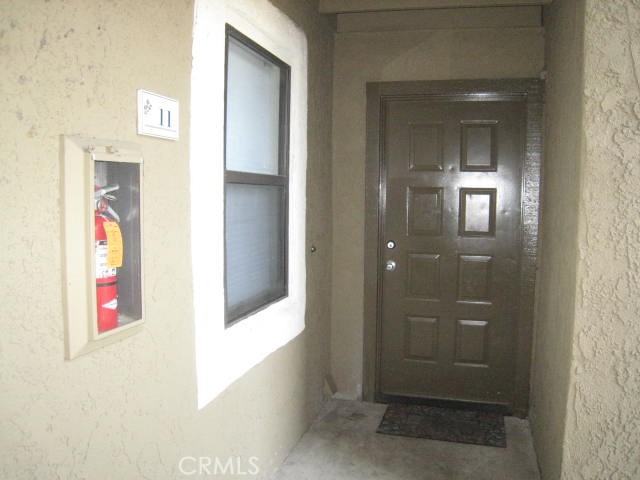 10151 Arrow Route, Unit 11 Rancho Cucamonga, CA 91730 - Photo 5 of 28 view of a hallway