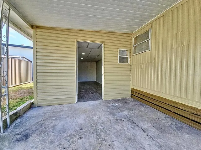 a view of a back yard of a house