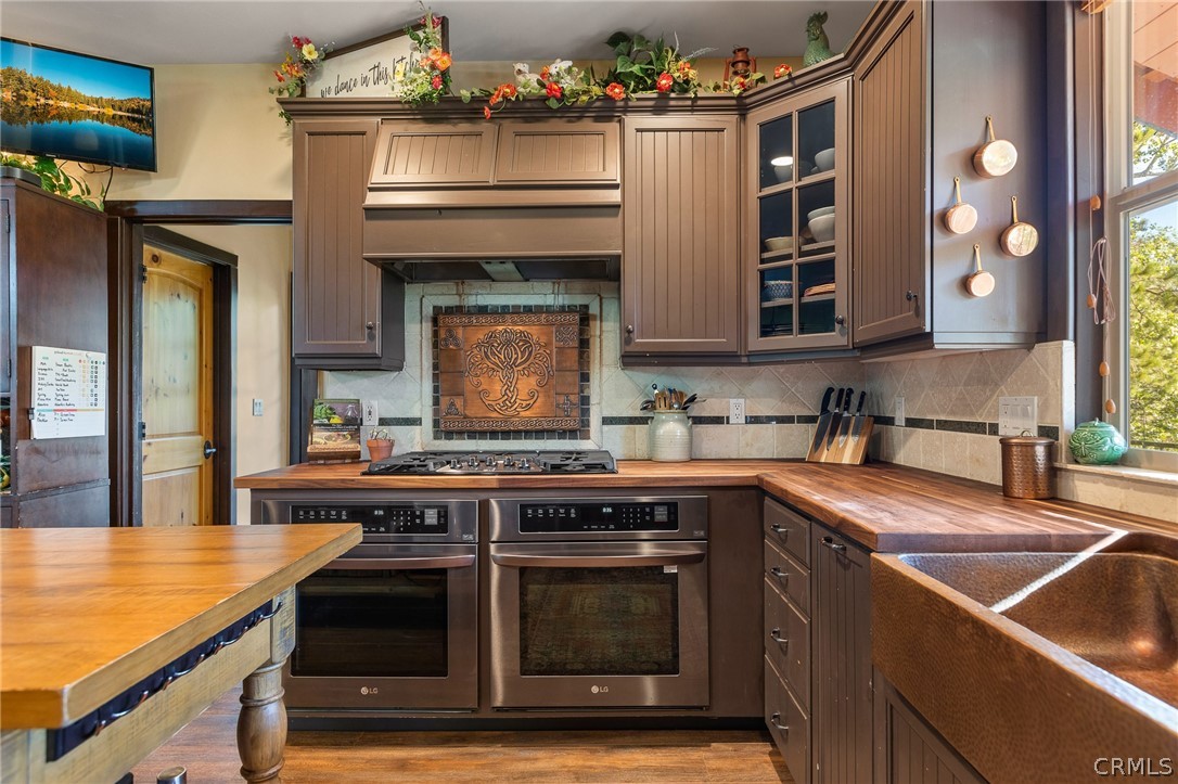 1224 Halifax Drive Lake Arrowhead, CA 92352 - Photo 13 of 35 a kitchen with a stove and a sink