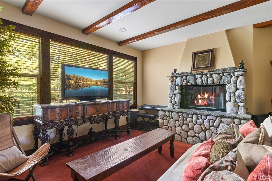 1224 Halifax Drive Lake Arrowhead, CA 92352 - Photo 16 of 35 a living room with furniture and a fireplace
