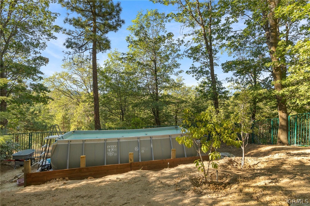 1224 Halifax Drive Lake Arrowhead, CA 92352 - Photo 32 of 35 a view of a house with a yard