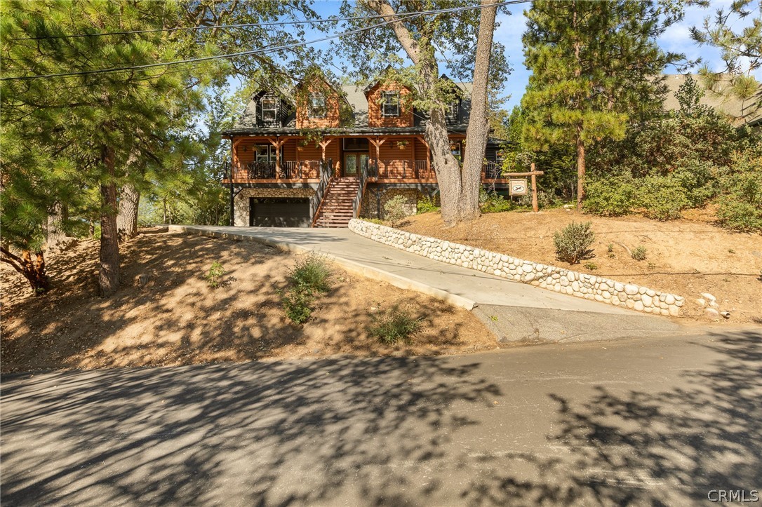 1224 Halifax Drive Lake Arrowhead, CA 92352 - Photo 35 of 35 a front view of a house with a yard