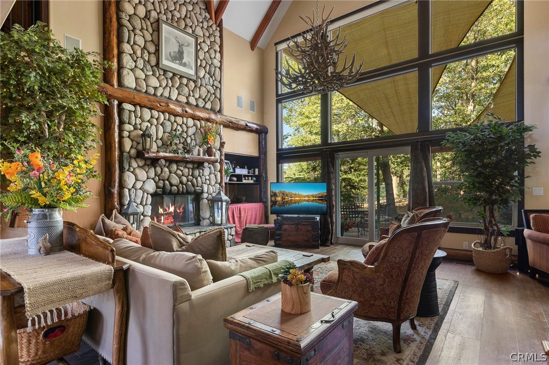 1224 Halifax Drive Lake Arrowhead, CA 92352 - Photo 4 of 35 a living room with furniture and a floor to ceiling window