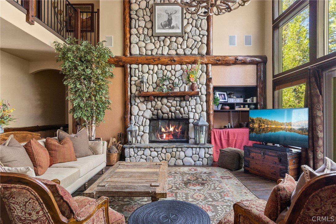 1224 Halifax Drive Lake Arrowhead, CA 92352 - Photo 6 of 35 a living room with furniture a window and a fireplace