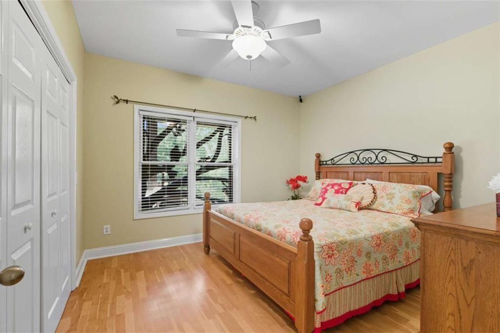 1091 Echota Road Clarkesville, GA 30523 - Photo 26 of 89 a bedroom with a bed and a window
