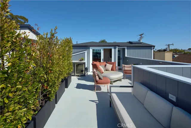 a outdoor living space with furniture and a garden