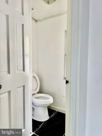 a bathroom with a sink a vanity and a mirror