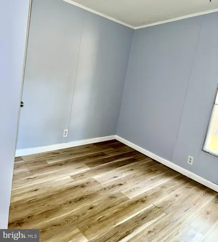 a bathroom with a toilet and a bathtub