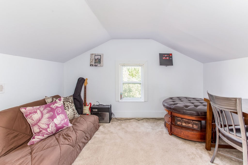 7920 Daugherty-Capley Road Primm Springs, TN 38476 - Photo 25 of 41 a bedroom with furniture and a window
