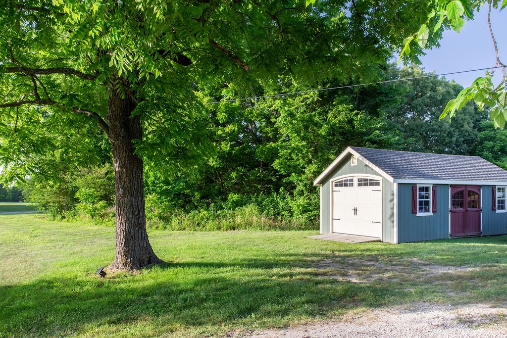 7920 Daugherty-Capley Road Primm Springs, TN 38476 - Photo 41 of 41 a view of a house with a yard