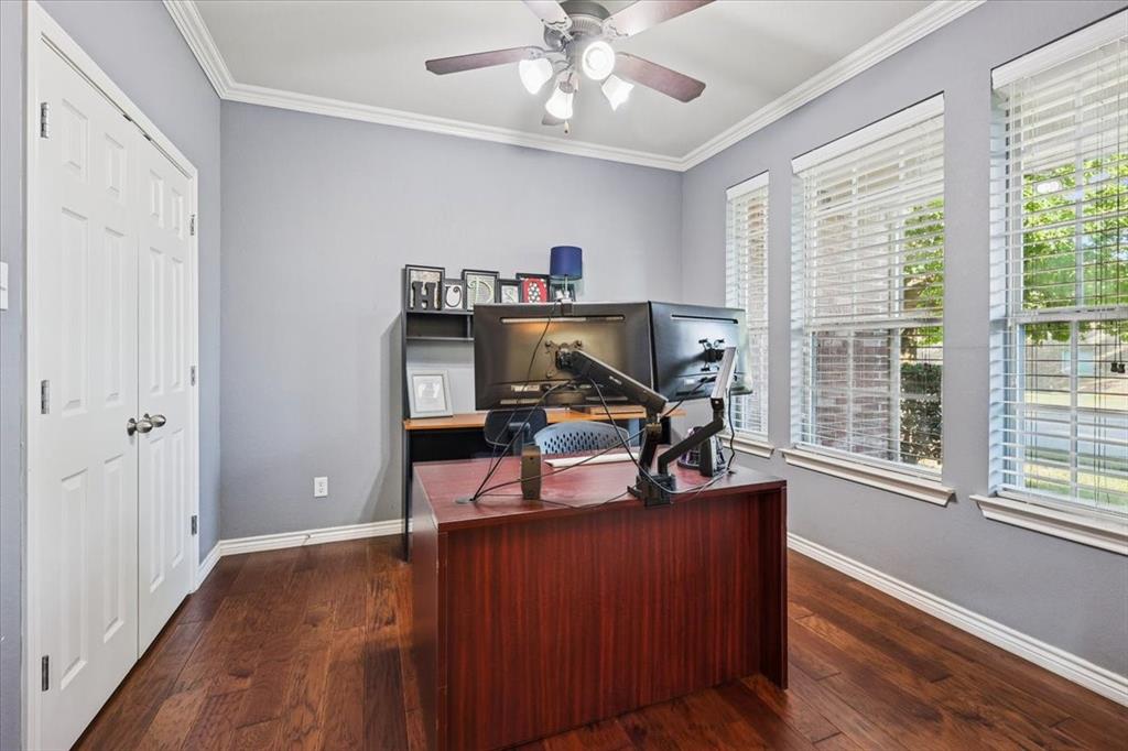 868 Valley Ridge Road Burleson, TX 76028 - Photo 5 of 40 a view of a workspace with furniture and a window