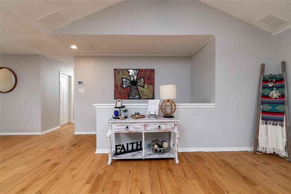 205 Timberlake Drive Azle, TX 76020 - Photo 12 of 40 a living room with hard wood floors and a wooden floor