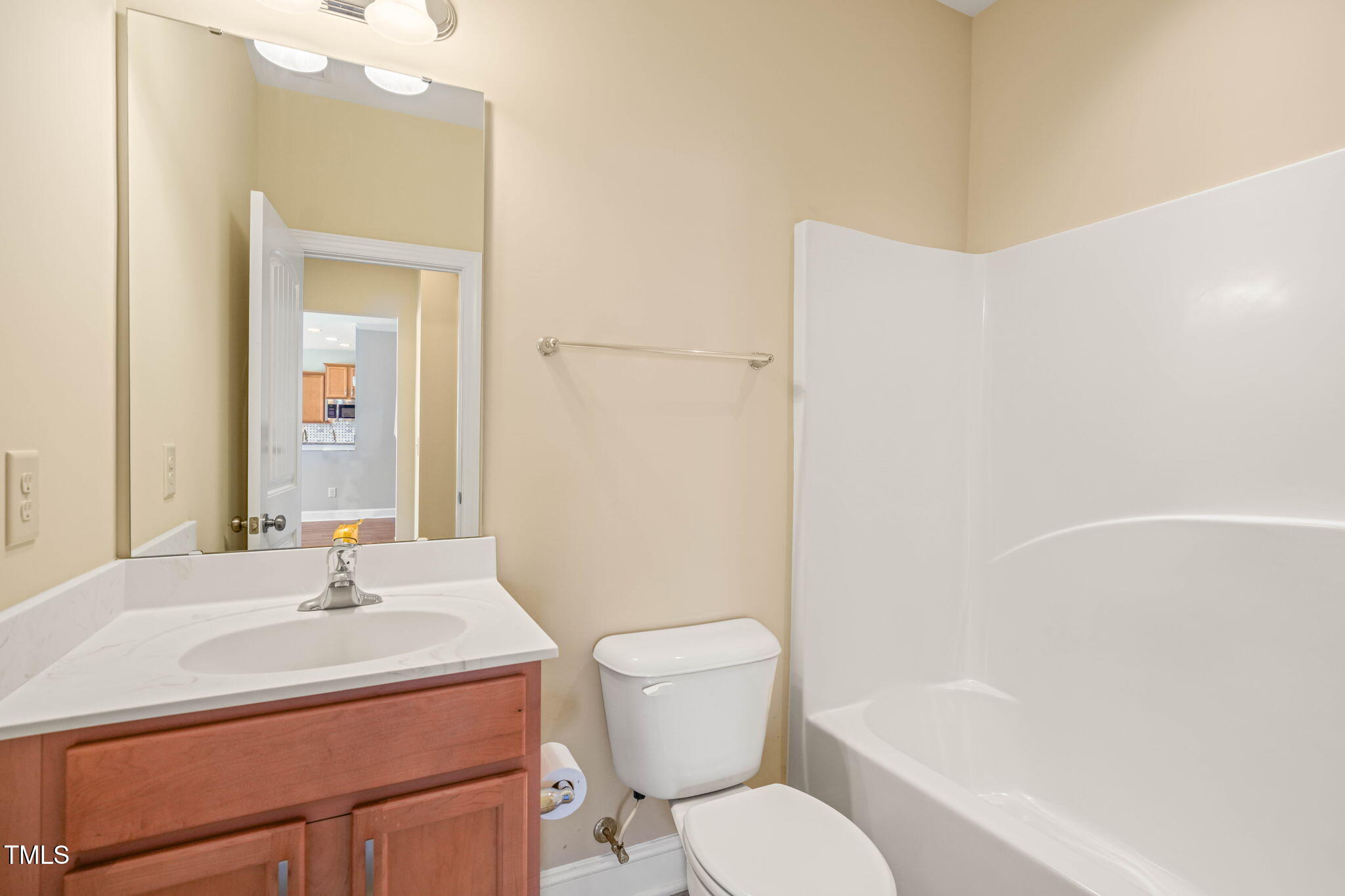 4508 Brintons Cottage Street Raleigh, NC 27616 - Photo 18 of 46 a bathroom with a sink toilet and shower