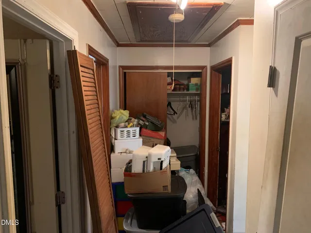 a room with furniture and shower