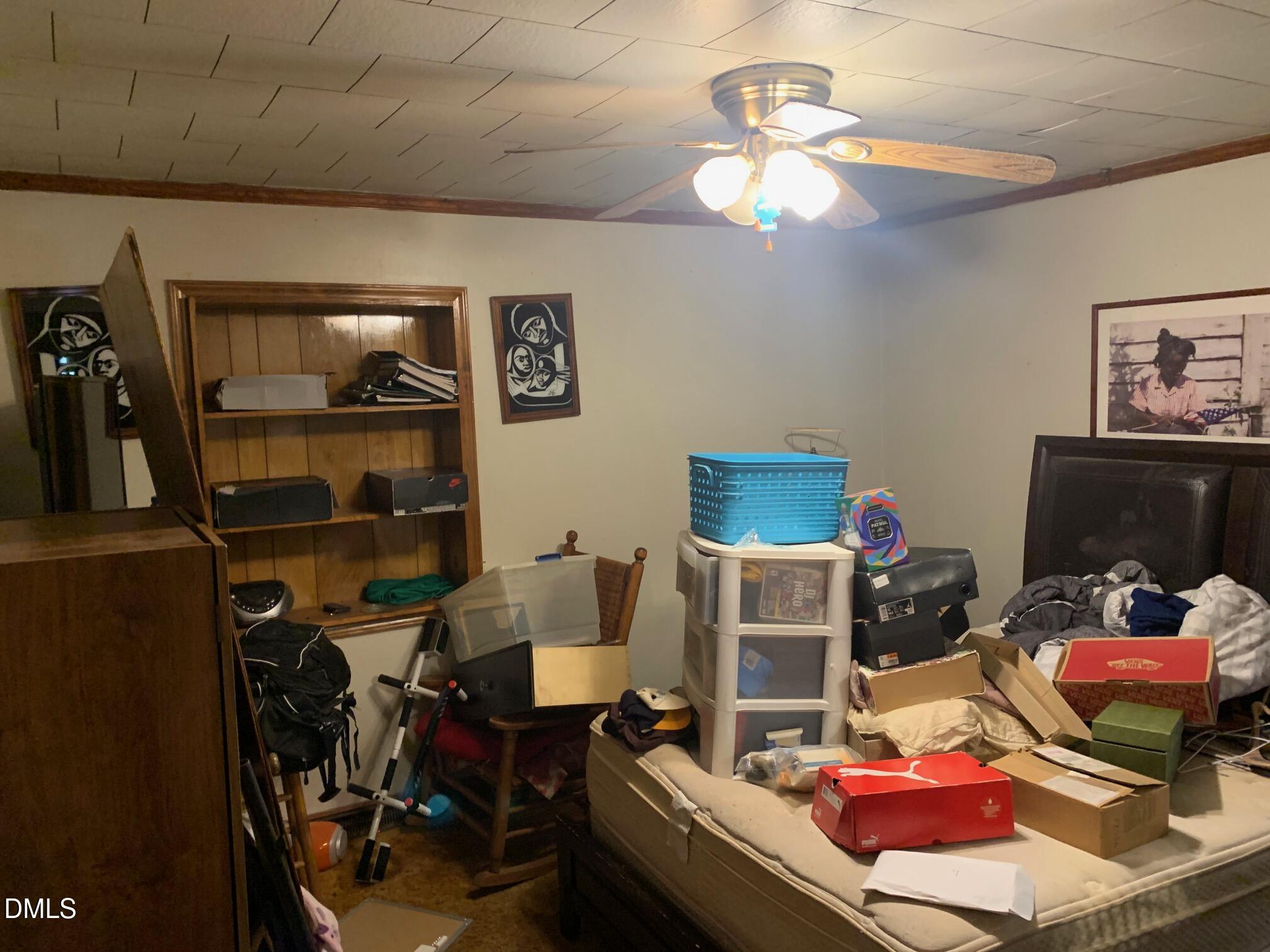 438 Dudley Street Burlington, NC 27217 - Photo 13 of 33 a room with furniture and workspace