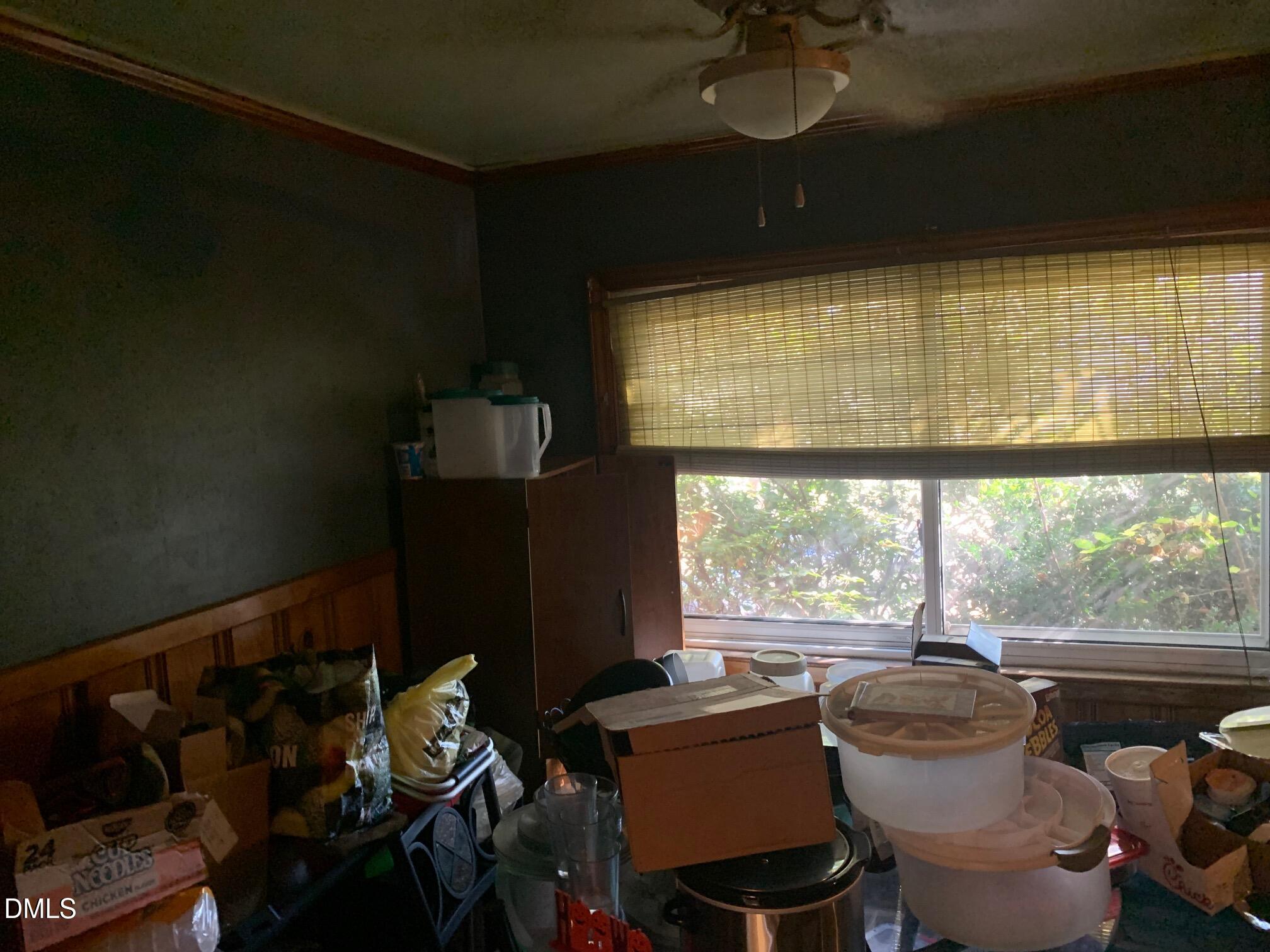 438 Dudley Street Burlington, NC 27217 - Photo 16 of 33 a room with furniture and a window