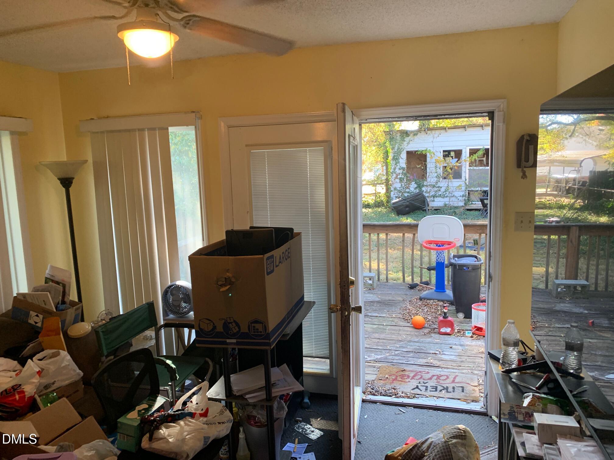 438 Dudley Street Burlington, NC 27217 - Photo 21 of 33 a living room with furniture and a window