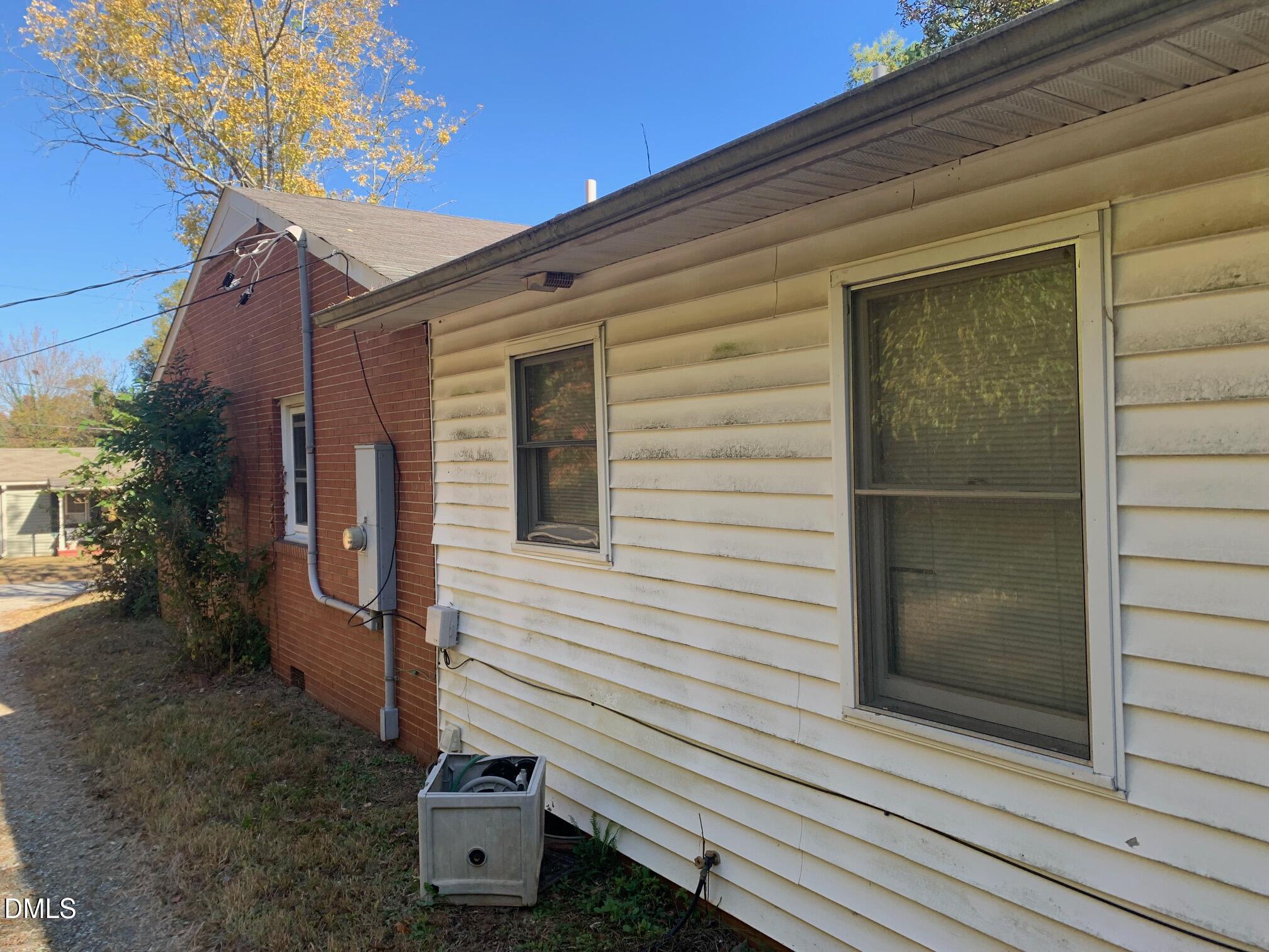 438 Dudley Street Burlington, NC 27217 - Photo 29 of 33 a view of a house with a yard