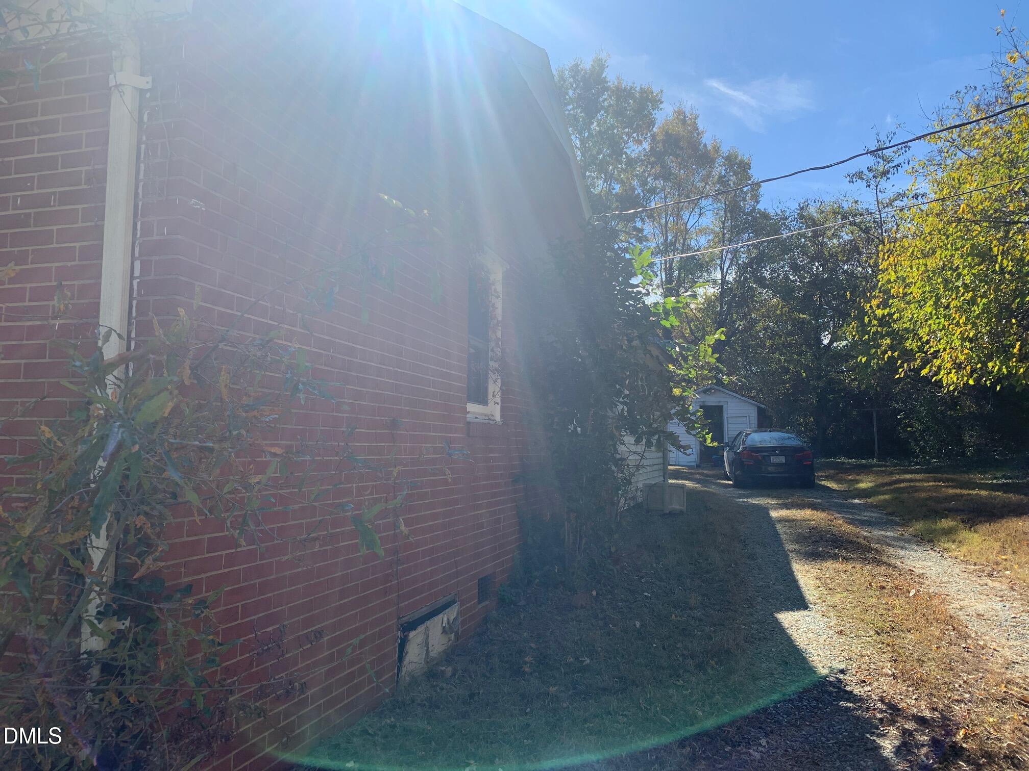 438 Dudley Street Burlington, NC 27217 - Photo 30 of 33 a view of a yard with plants and trees