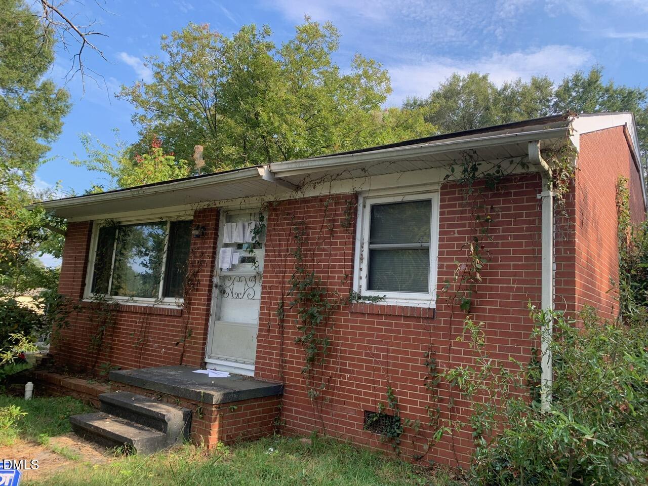 438 Dudley Street Burlington, NC 27217 - Photo 3 of 33 front view of a house with a yard