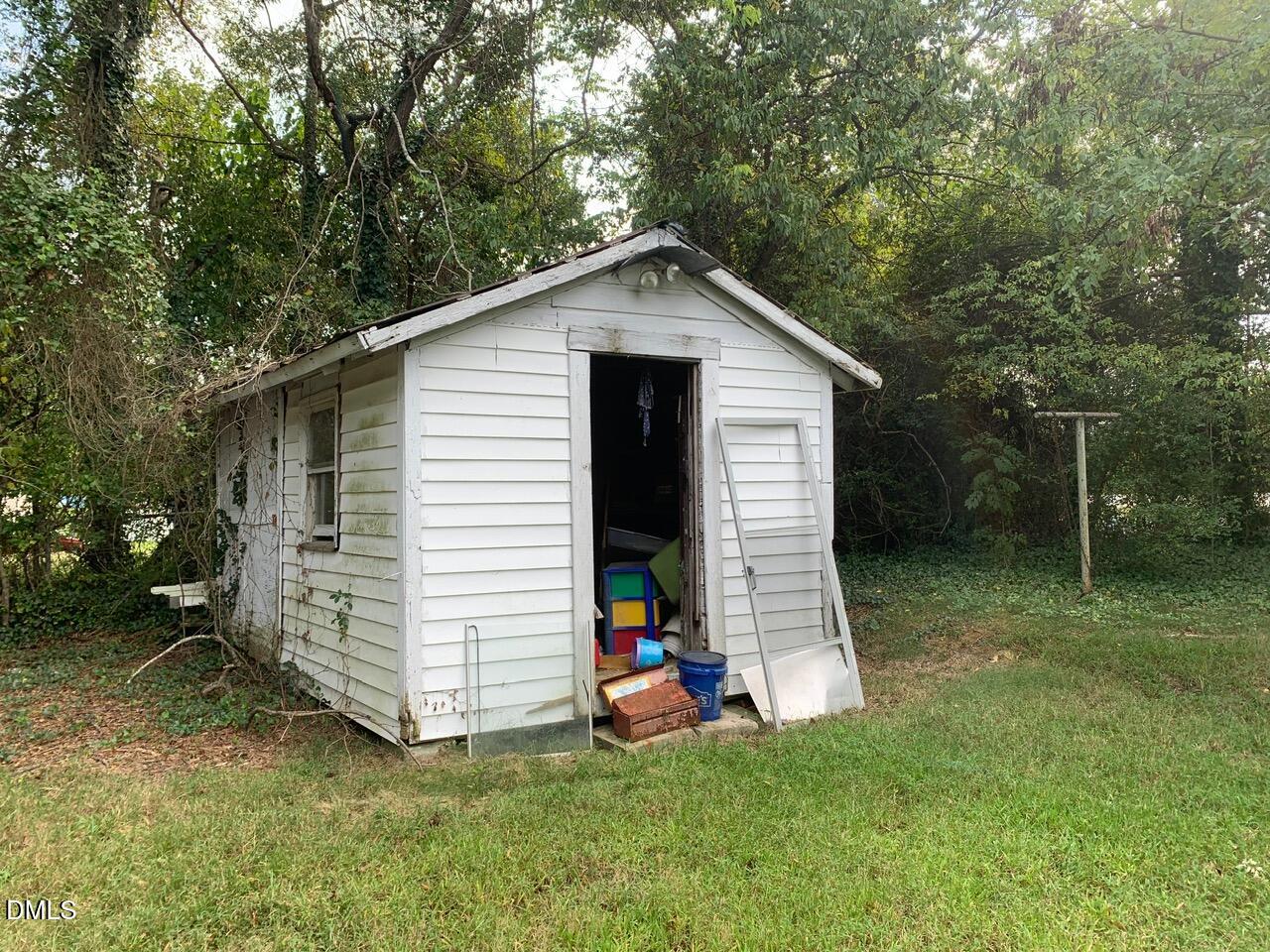438 Dudley Street Burlington, NC 27217 - Photo 9 of 33 a view of a house with a yard