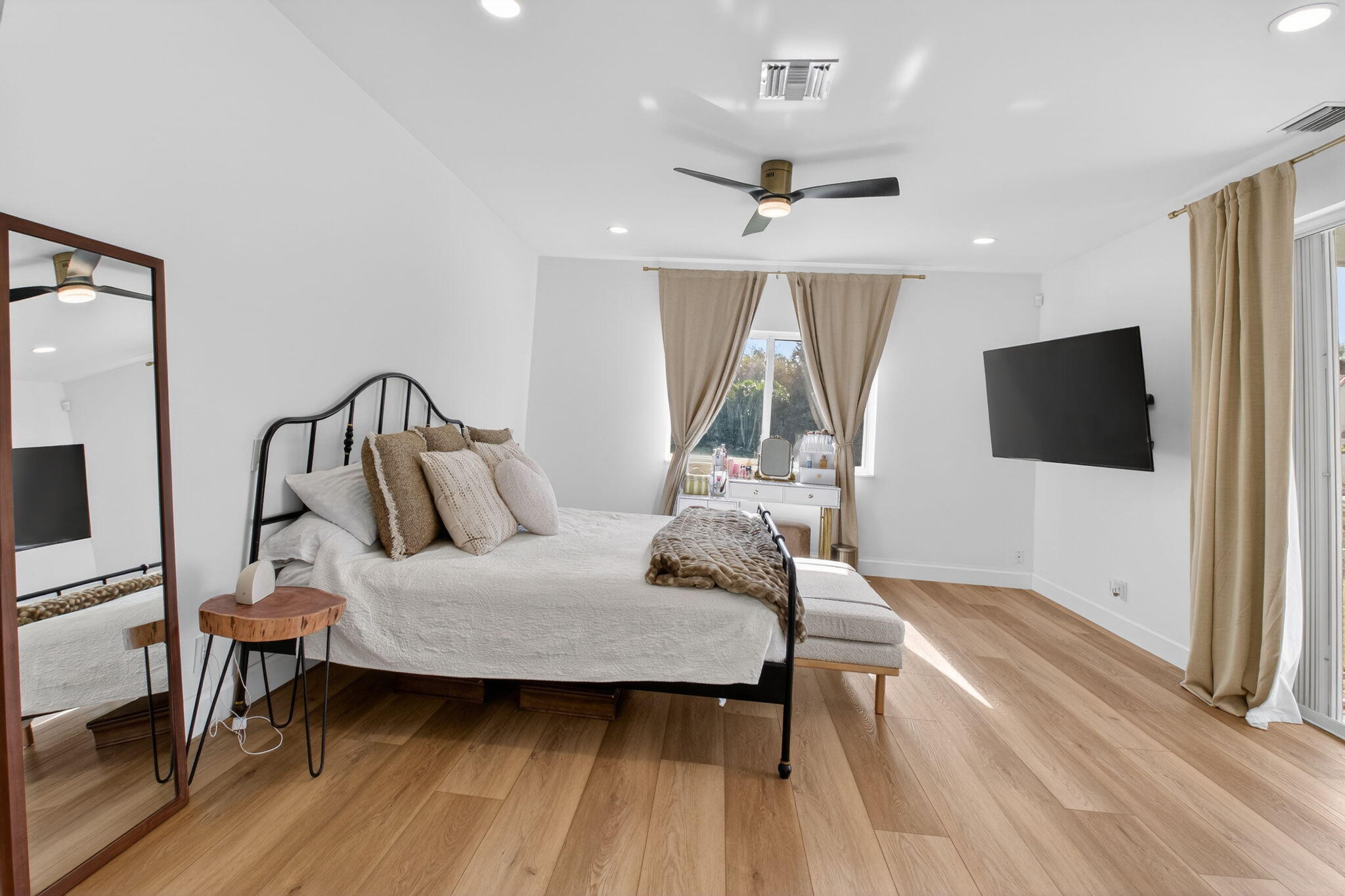 17108 Newport Club Drive Boca Raton, FL 33496 - Photo 9 of 39 a bedroom with furniture and a flat screen tv