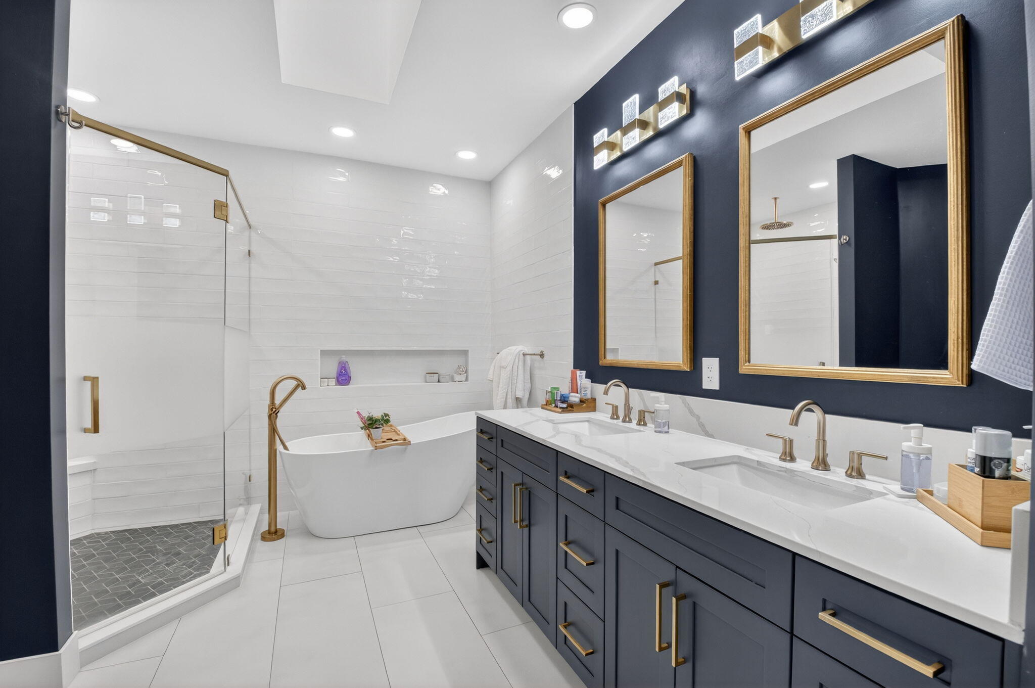 17108 Newport Club Drive Boca Raton, FL 33496 - Photo 11 of 39 a bathroom with a double vanity sink mirror and bathtub