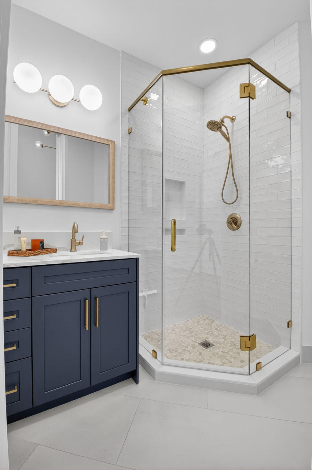 17108 Newport Club Drive Boca Raton, FL 33496 - Photo 16 of 39 a bathroom with a tub shower sink and mirror