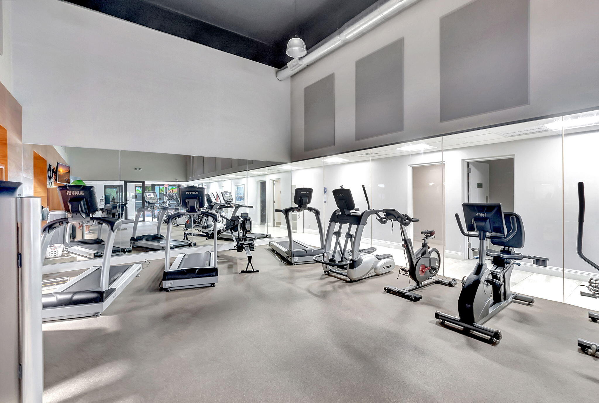 17108 Newport Club Drive Boca Raton, FL 33496 - Photo 32 of 39 a view of a room with gym equipment