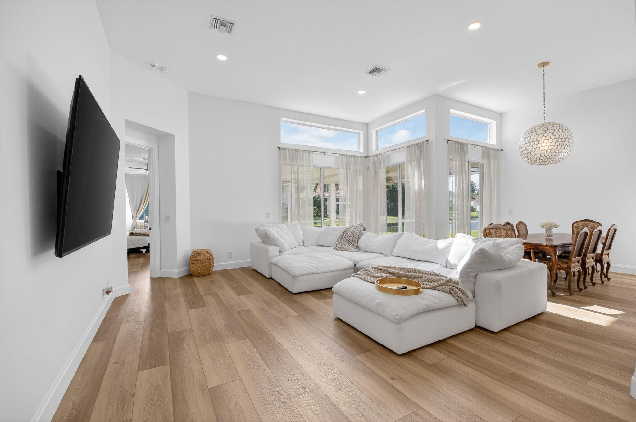 17108 Newport Club Drive Boca Raton, FL 33496 - Photo 39 of 39 a living room with furniture and a flat screen tv