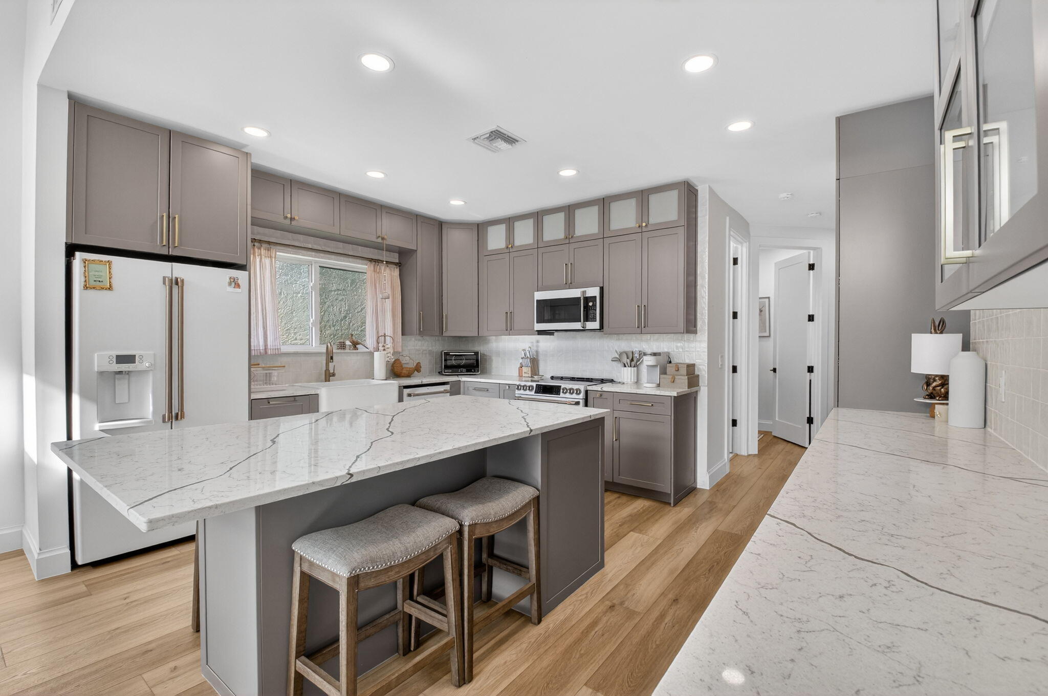 17108 Newport Club Drive Boca Raton, FL 33496 - Photo 5 of 39 a large kitchen with cabinets