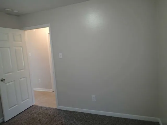 an empty room with closet
