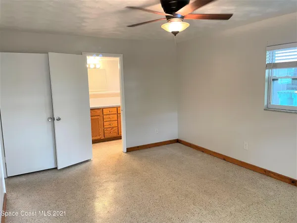 a bathroom with a sink a toilet and vanity